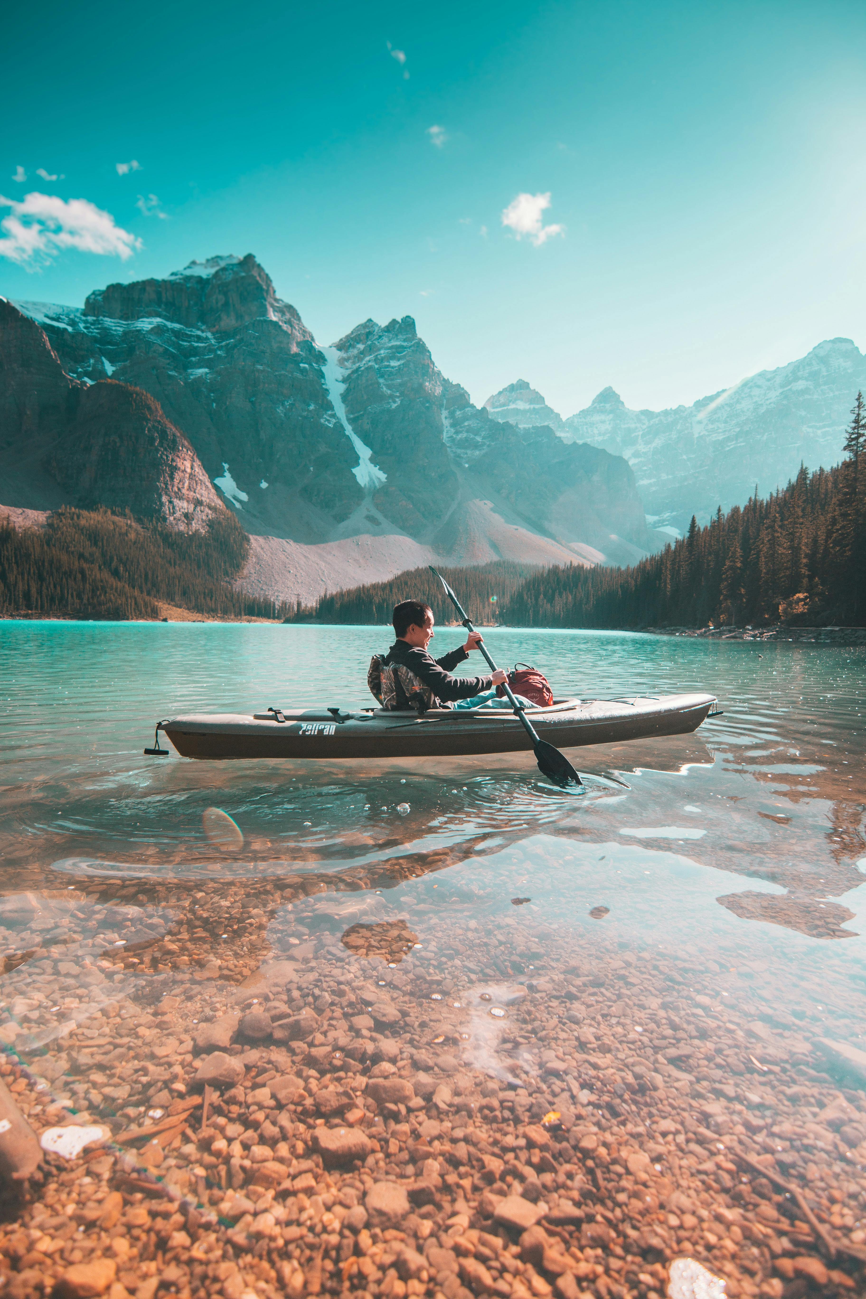 Canadian Mountain Lake and Kayaker